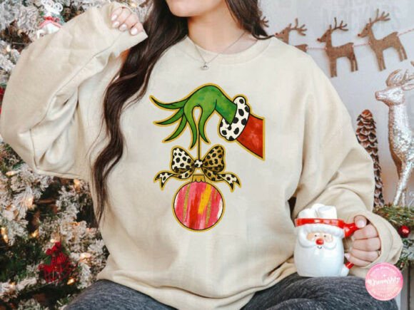 Grinch Hand Holding Christmas Ornaments Sweatshirt