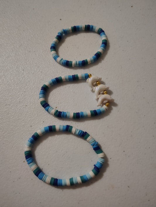 Beautiful set of Seed Bead Bracelets with White Dolphins